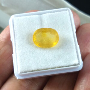 Natural and certified yellow sapphire (pukhraj) oval stone