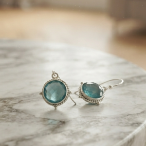 Fancy and attractive blue zircon silver plated earrings.