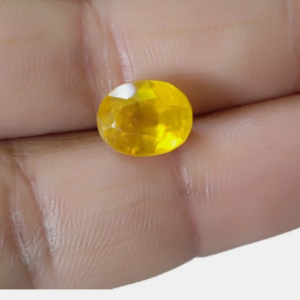 Natural and certified yellow sapphire (pukhraj) 5.25 ratti oval shape stone