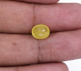 Alternative view of Natural and certified 4.25 ratti yellow sapphire oval stone