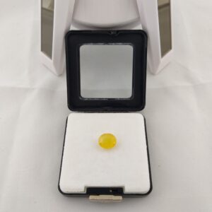 Alternative view of Natural and certified 5.25 to 7.25 ratti yellow sapphire oval stone